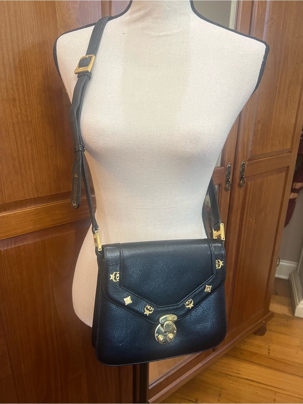 MCM Black Leather Shoulder Bag with Gold Hardware